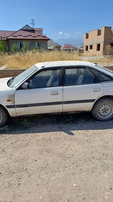 чехол б у: Mazda 626: 1990 г., 2.2 л, Механика, Бензин, Хетчбек