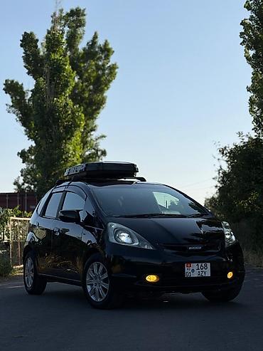 Honda Fit: 2009 г., 1.3 л, Автомат, Бензин, Хэтчбэк — 2