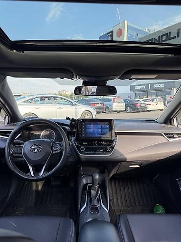 электромот: Toyota Corolla: 2021 г., Гибрид, Седан — 7
