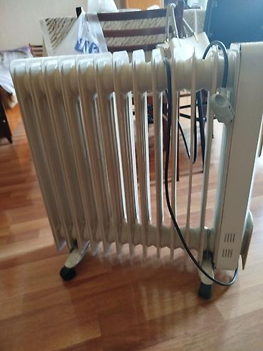 Yağlı radiator tipli elektrikli isidici - 11 bölməli (sek­siyalı) yağ