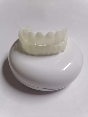 Ostalo: Snap on Smile navlake za zube 
Cena:3600din/par gornja i donja — 5