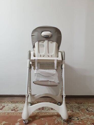 детский стульчик для кормления цена: Продаю стульчик для кормления от фирмы Skilmax. Сиденье из ЭКО кожи и