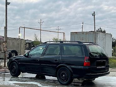 opel vectra b: Opel Vectra: 2 l | 1997 il 499300 km Universal — 7