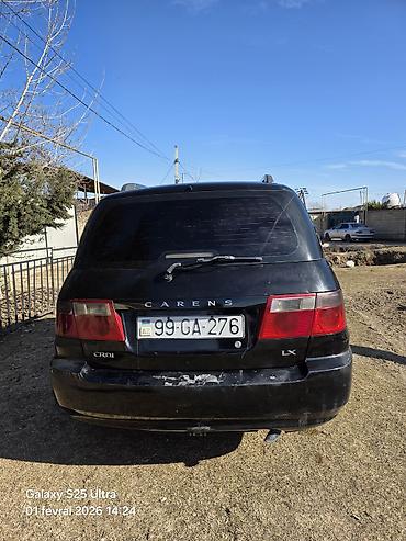 kia r17: Kia Carens, qara rəng, 5 qapılı MPV/miniven. - dizel mühərriki, ön — 5