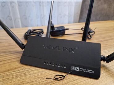 Modemlər və şəbəkə avadanlıqları: Wavlink router .hem wi fi router hemde repeater rolunu oynayir .yeni