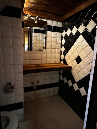 Kommersiya daşınmaz əmlakının satışı: Nizami metrosunun yaxınlığında, Qoç ət restoranın yanında 16 mərtəbəli — 11