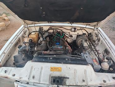 QAZ: GAZ-3110 Volga sedan - Kuzov: 4 qapılı sedan, ağ rəng - Mühərrik — 5