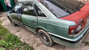 ом 615: Mazda 626: 1985 г., 0.2 л, Механика, Бензин, Хэтчбэк — 8