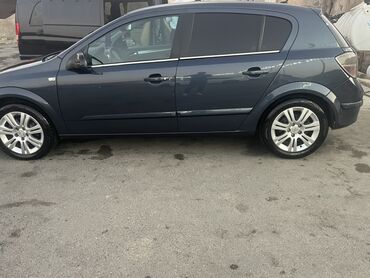 Opel: Opel Astra H – 5 qapılı hetçbek Xüsusiyyətlər: - Kuzov — 9