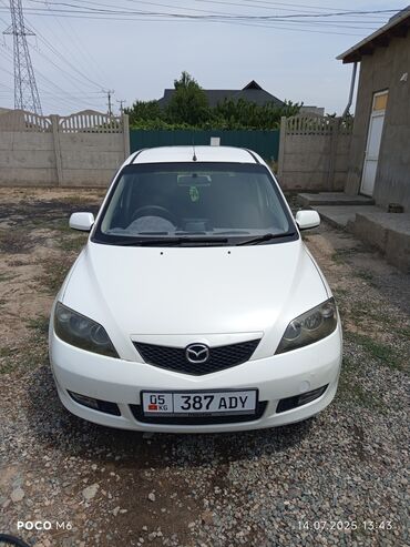 спортивный мото: Mazda : 2004 г., 1.5 л, Автоматические, Бензин