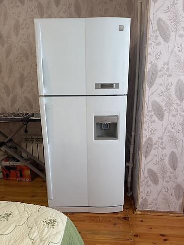 dispenser satilir: İki qapılı soyuducu (üstdən dondurucu) - Rəng: Ağ - Qapı sayı: 2 — 4