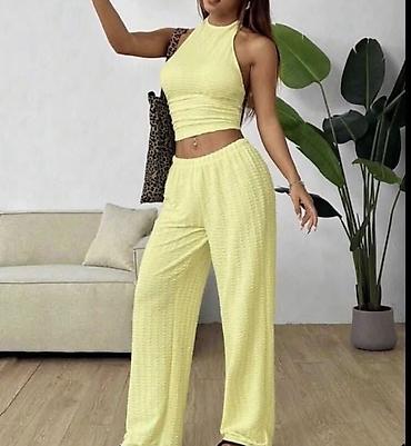 Kompleti: Ženski komplet – top bez rukava + široke pantalone. - Top: pripijena na lalafo.rs — 1 Kompleti: Ženski komplet – top bez rukava + široke pantalone. - Top: pripijena — 1