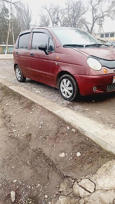 Другие автомобили: Компактный городской хэтчбек бордового цвета. Основные особенности: - — 9