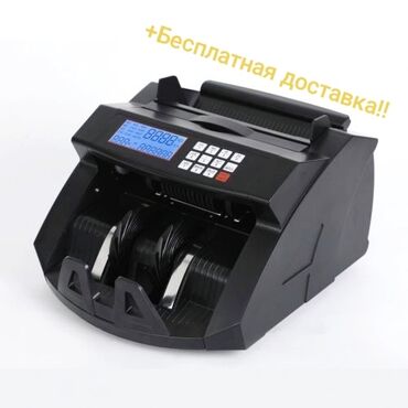 аппаратный кошелек: Надежный счетчик банкнот черного цвета, предназначенный для быстрого и