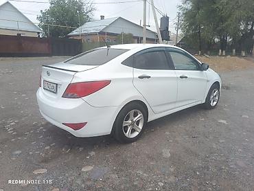 Унаа: Hyundai Solaris: 2015 г., 1.4 л, Кол менен иштөөчү, Бензин, Седан — 5