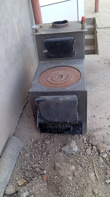 посуда керамика: Дровяная печь-плита с варочной поверхностью. Особенности: - Топочная