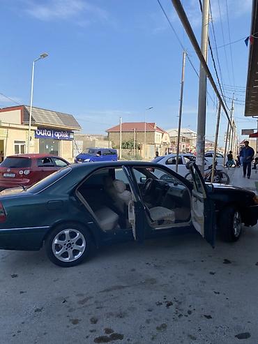 kia rio 2018: Mercedes-Benz C-Class: 1.8 l | 1995 il Sedan — 2