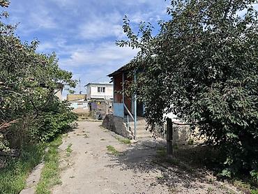 70000: > Дом с большим потенциалом в г. Каракол! (ул. Орозбекова, 32) > — 2