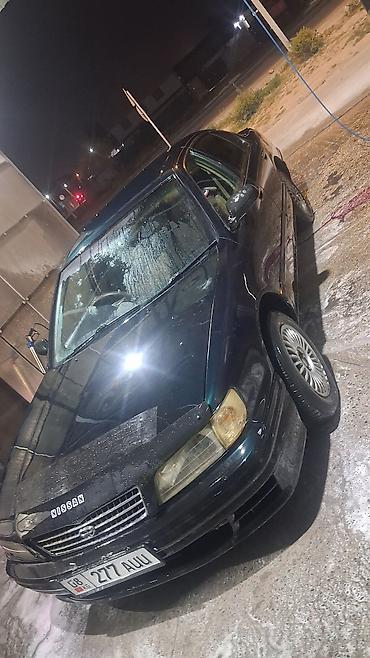 шины на карнивал: Nissan Sunny: 1998 г., Автомат, Бензин, Седан — 1