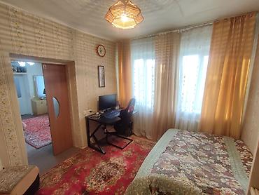 Продажа полдома: Продается пол дома в центре Рабочего Городка. Общий участок 4 сотки — 9