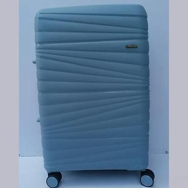 Putni koferi i torbe: Tvrdi kofer na točkiće – svetloplava boja - Materijal: čvrsta — 6