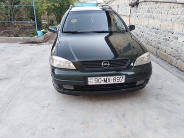 Opel: Opel Astra Caravan (universal) – tünd yaşıl rəng • Kuzov: universal — 4
