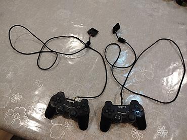slaqbaum pultlari: Məhsul: 2 ədəd Sony PlayStation 2 (PS2) naqilli oyun pultu — 1