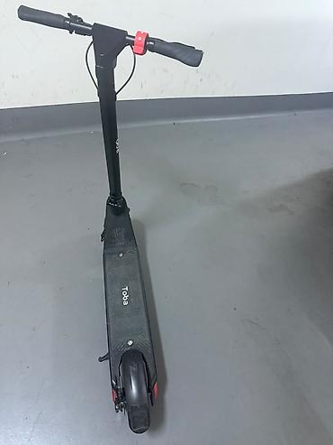 elektrikli scooter toba: Elektrikli skuter – Toba - Rəng: qara, yığcam və minimal dizayn - — 5