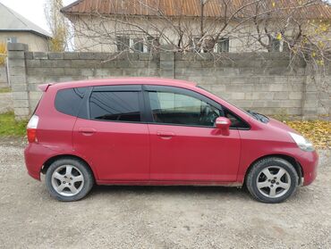 красные линзы: Honda Fit: 2001 г., 1.3 л, Вариатор, Бензин