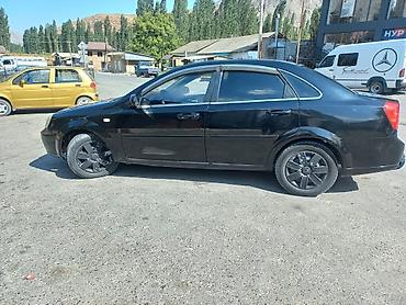 с номерами: Chevrolet Lacetti: 2009 г., 1.6 л, Механика, Бензин, Седан — 2