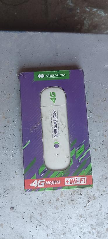 титан дики: Новый почти не пользовались. 4G USB‑модем MegaCom с функцией Wi‑Fi - — 1