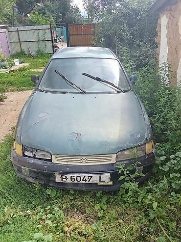 фикс токмок: Mazda 626: 1993 г., 1.8 л, Механика, Бензин — 4