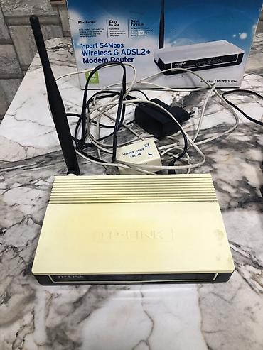 ikinci əl ıran pecləri: Wi-Fi internet ucun modem router TP-LINK . Islek veziyetde . Biri 10 — 2