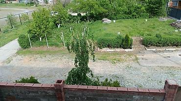 Продажа коттеджей и домов: Двухэтажный дом с огороженным участком и коваными воротами угловое — 10