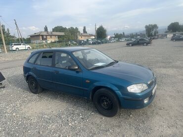 Mazda: Mazda 323: 1999 г., 1.5 л, Механика, Бензин, Хэтчбэк