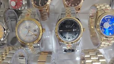 rolex daydate: Məhsul: Kvars mexanizmli klassik kişilər üçün qol saatları (Rolex — 4