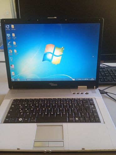 Monitorlar: Fujitsu Simens noutbuku normal işlək vəziyyətdədir ofis programları və