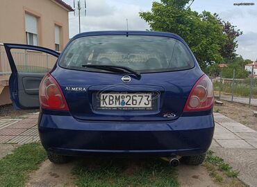 Μεταχειρισμένα Αυτοκίνητα: Nissan Almera: 1.5 l. | 2004 έ. Χάτσμπακ