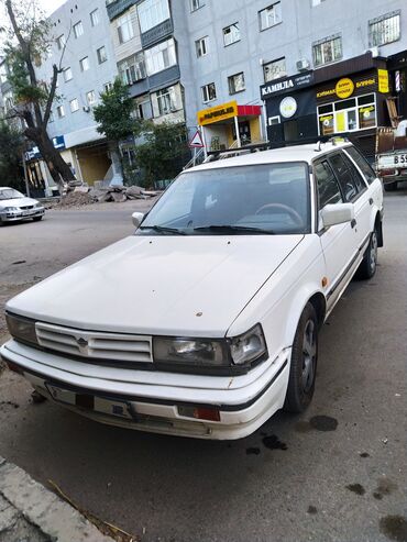 х трел: Nissan Bluebird: 1990 г., 2 л, Механика, Бензин, Универсал