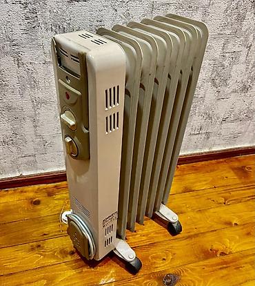 Yağ radiatoru – 9 seksiyalı, elektriklə işləyən portativ isitmə