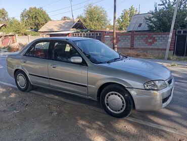 машина getz: Mazda 323: 2000 г., 1.5 л, Автомат, Бензин, Седан