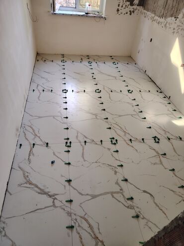 Plitə işləri: Peşəkar kafel-metlax və mərmərə bənzər porselen plitələrin döşənməsi — 13