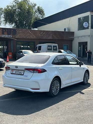 на corolla: Toyota Corolla: 2022 г., 1.8 л, Автомат, Гибрид, Седан — 7