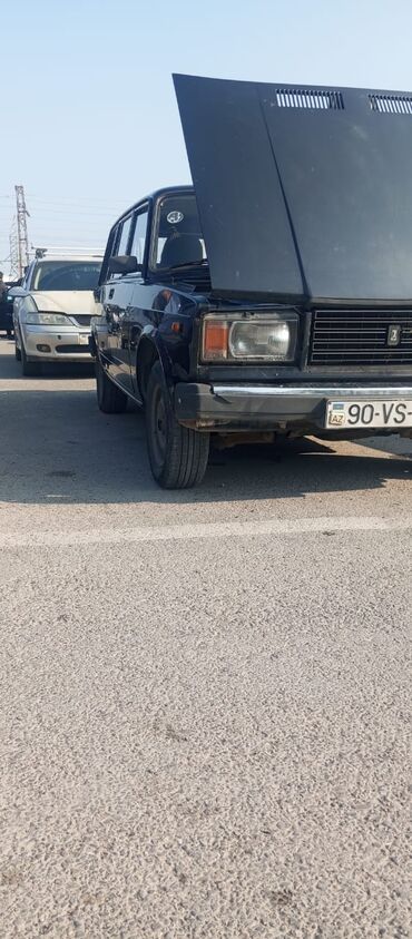 VAZ (LADA): Model: LADA 2104 (universaI) Rəng: qara Kuzov: 5 qapılı, yük bölməsi — 7
