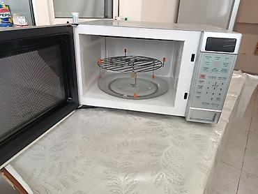 Mətbəx texnikası: SANYO Cook ‘n’ Grill mikrodalğalı soba Xüsusiyyətlər: - 1 100 W güc — 4