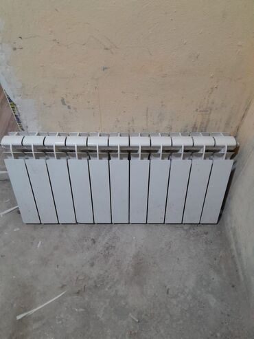 radiator isidici: Seksiyalı Radiator