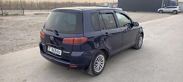 обмен с доплатой: Mazda Demio: 2003 г., Автомат, Бензин — 8