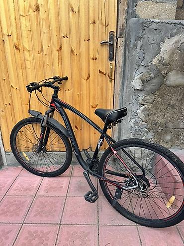velosipedlər isma: Berkut DM-900 dağ velosipedi - Gediş üçün universal 29” təkərlərli — 2