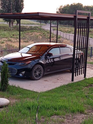 деу легенза: Представляем черный седан Toyota Avalon Hybrid, оборудованный