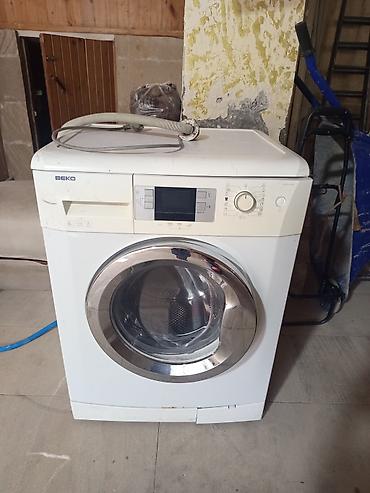 Beko işlekdir amma paltari suda saxlayir sıxıb qurulamır -